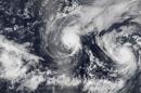 Hurricane Iselle and Hurricane Julio are pictured en route to Hawaii in this NASA handout satellite image